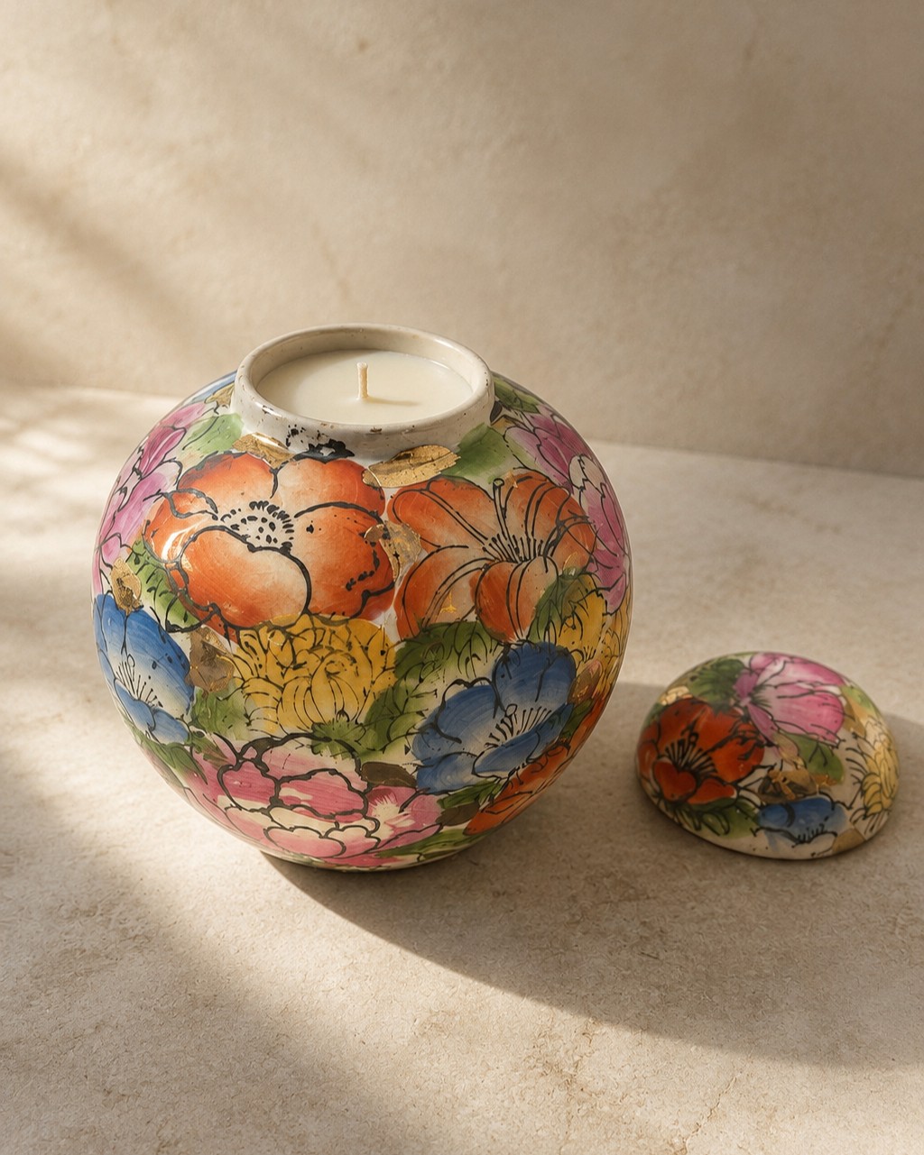 Rounded floral porcelain jar with matching lid