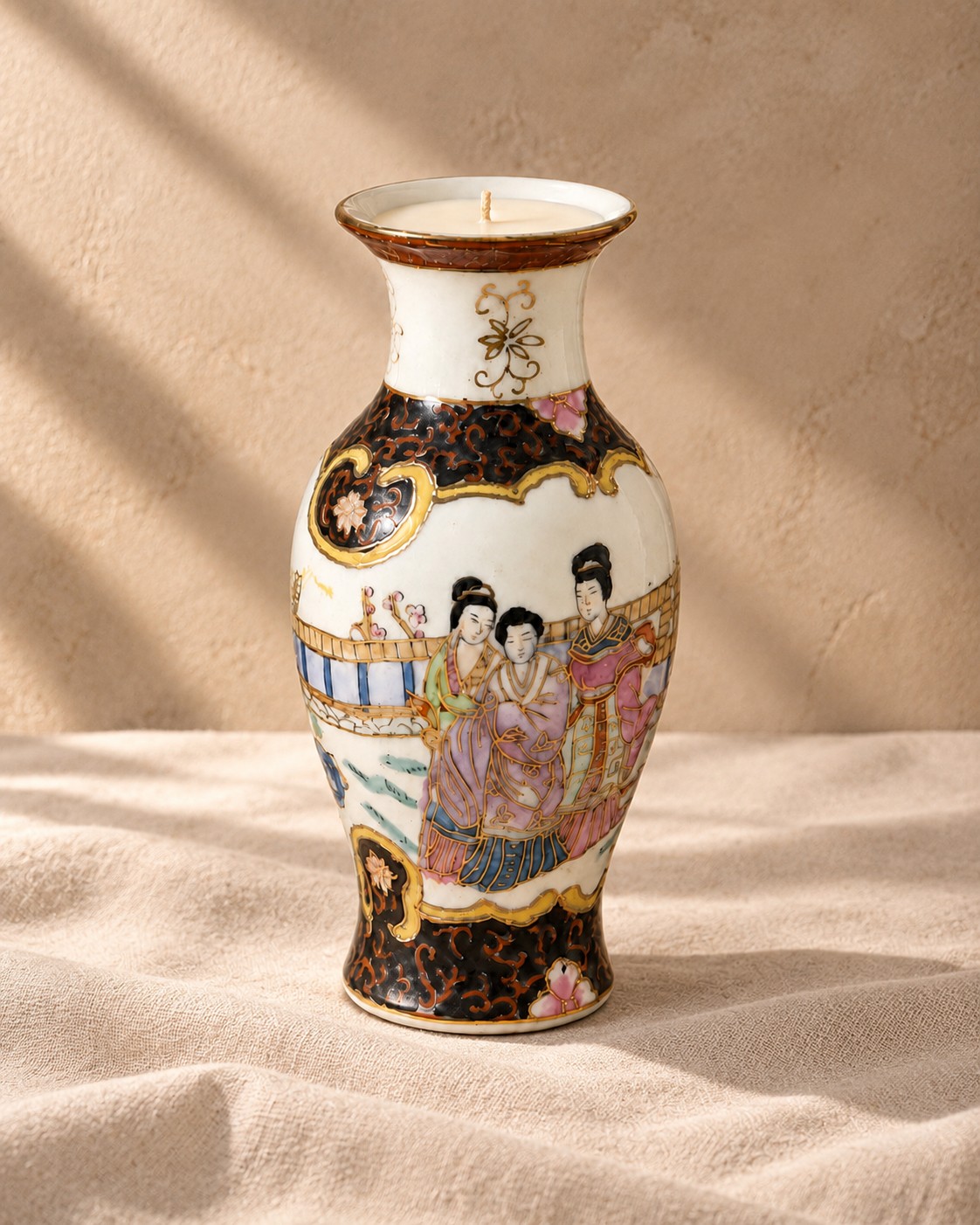 Slender figural porcelain vase with court scene