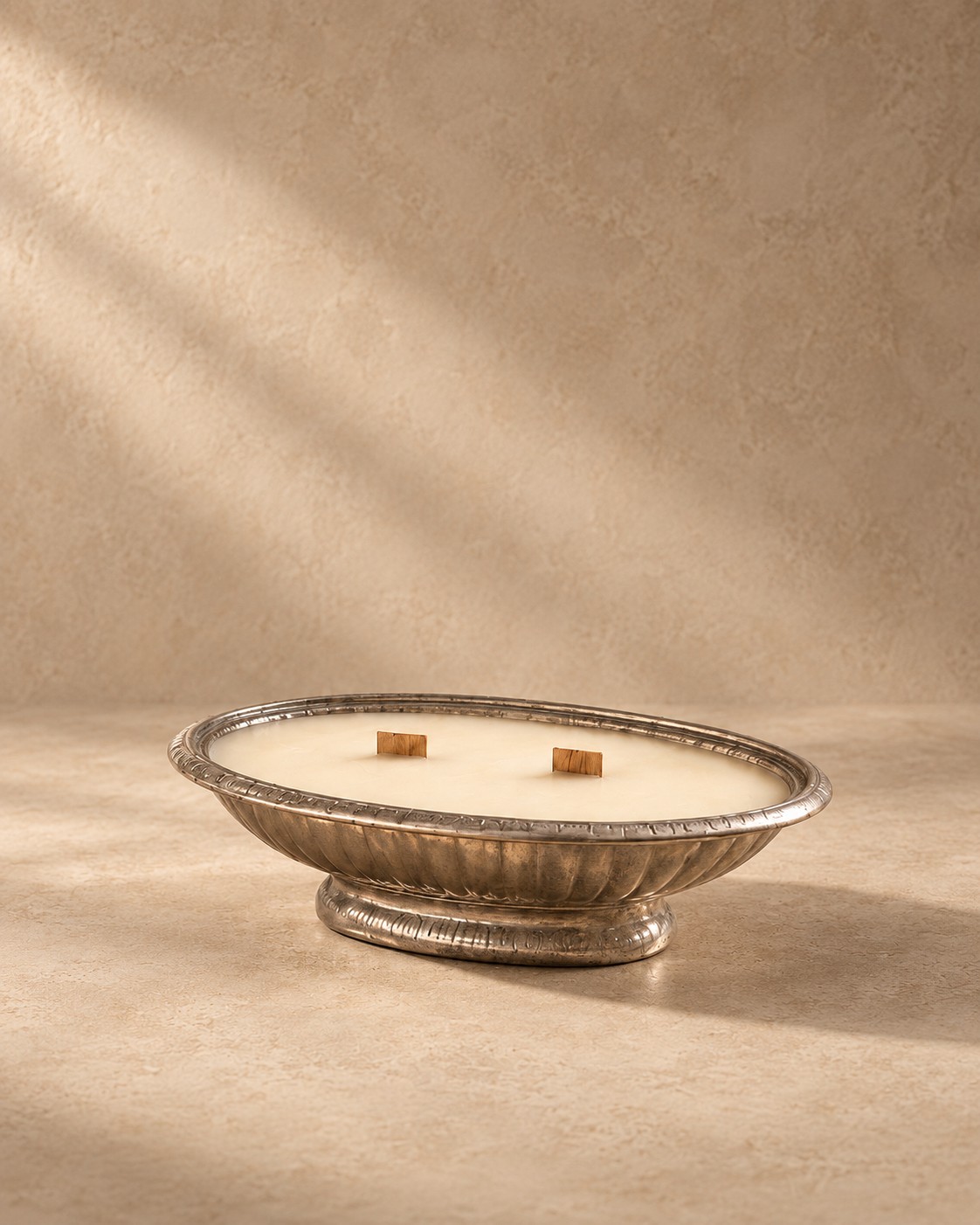 Low oval silver-tone pedestal dish
