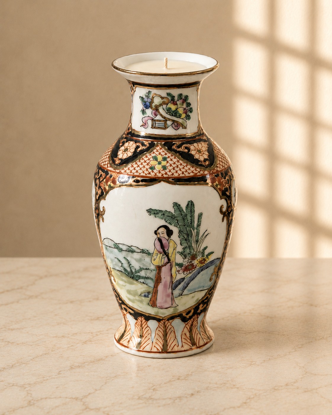 Slender figural porcelain vase with garden scene