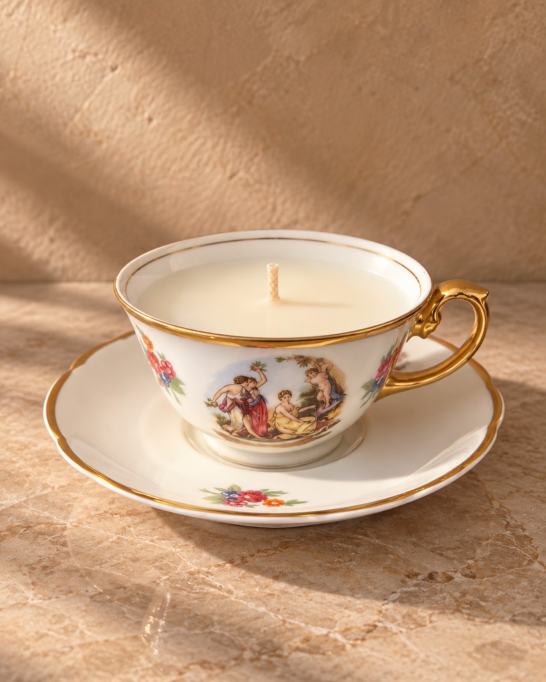 Brazilian gilt figurative teacup