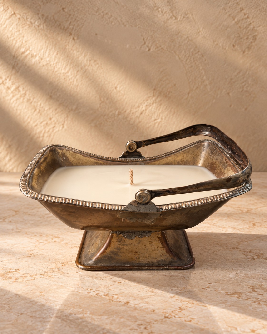 Wolverine silver-plated basket candle